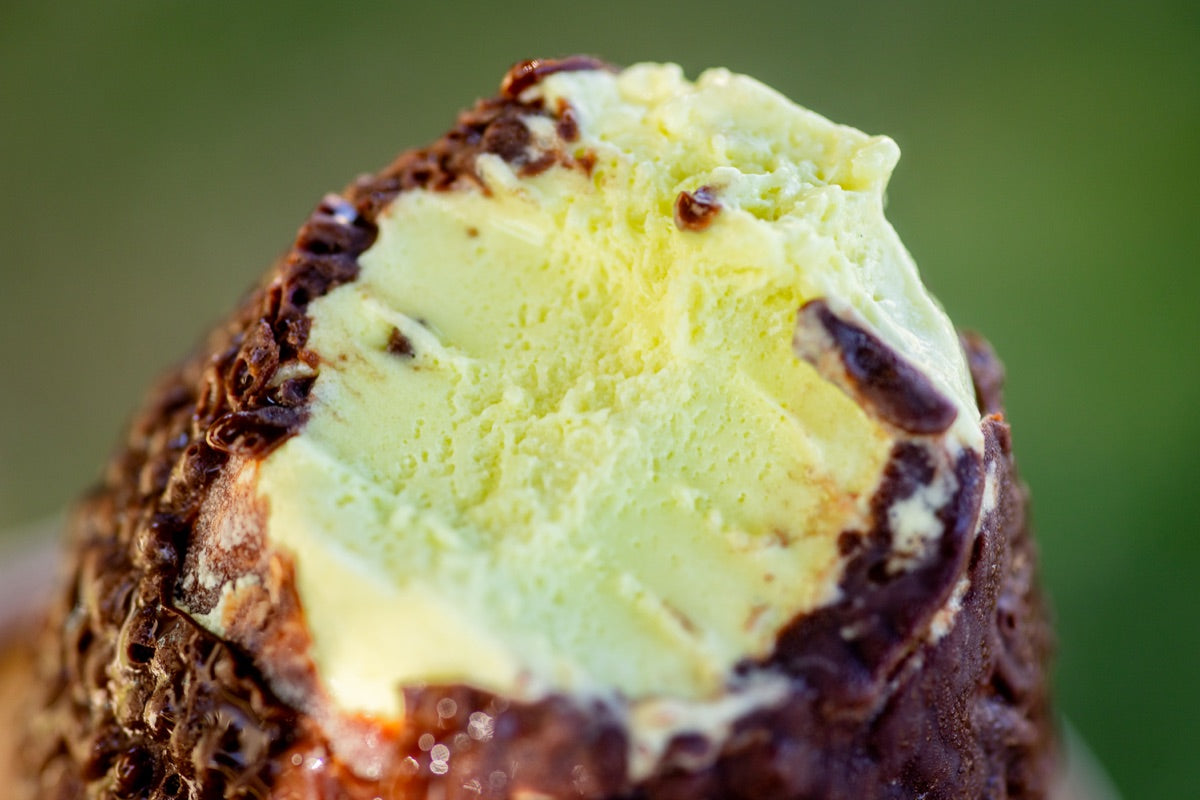 Close-up of the green center and textured coating of Tu Cha Avocado